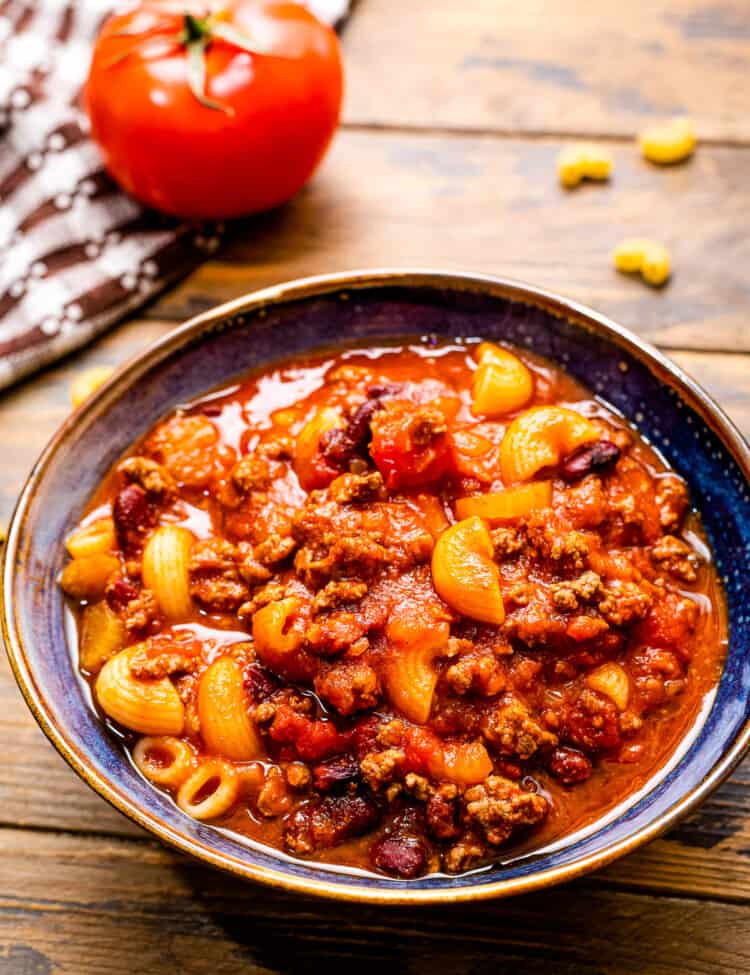 A bowl with cooked chili mac on it