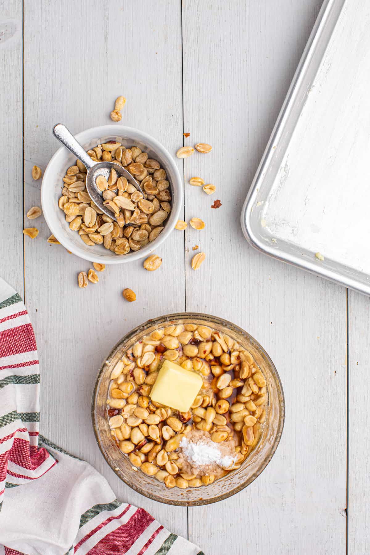 Adding butter to peanut brittle mixture