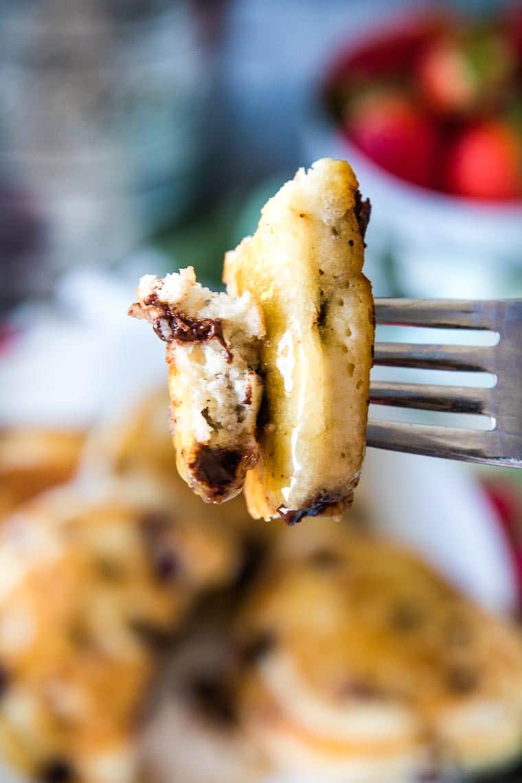 Bite of chocolate chip pancake on fork