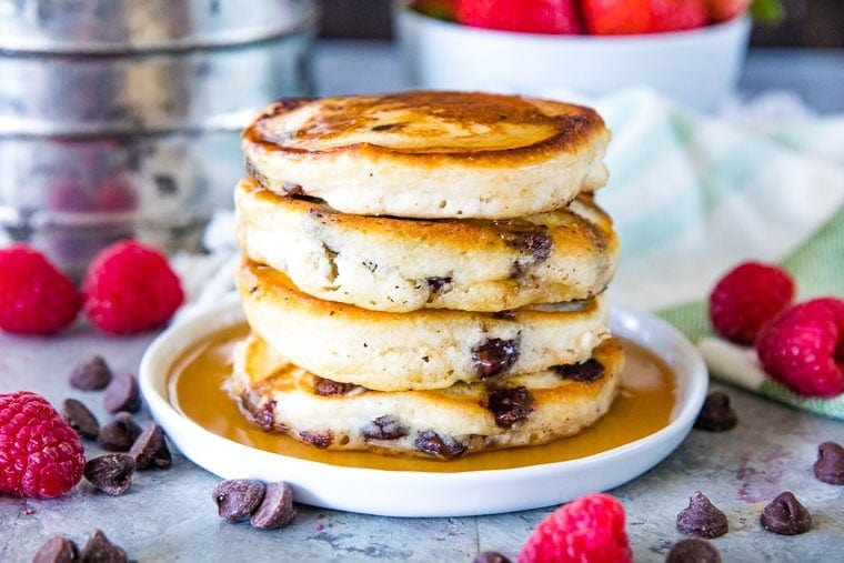 Stack of chocolate chip pancakes on plate