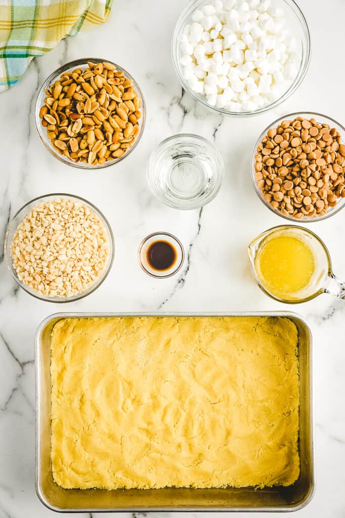 Overhead image of raw cake mix crust in cake pan