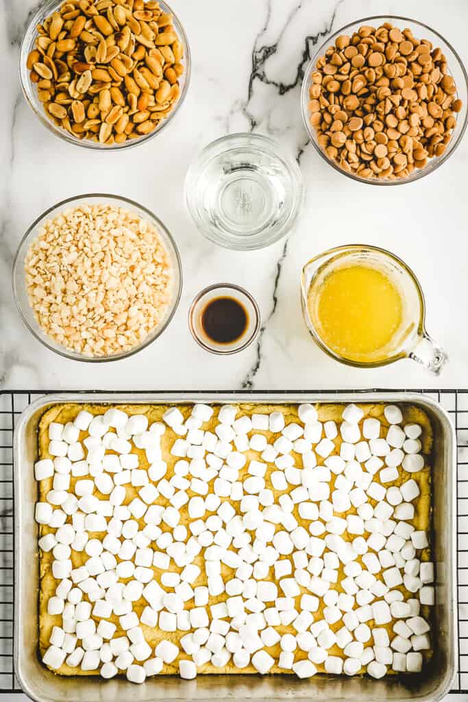 Overhead image of marshmallows on crust for bars