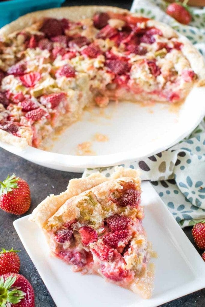 The Best Strawberry Rhubarb Pie in white plate