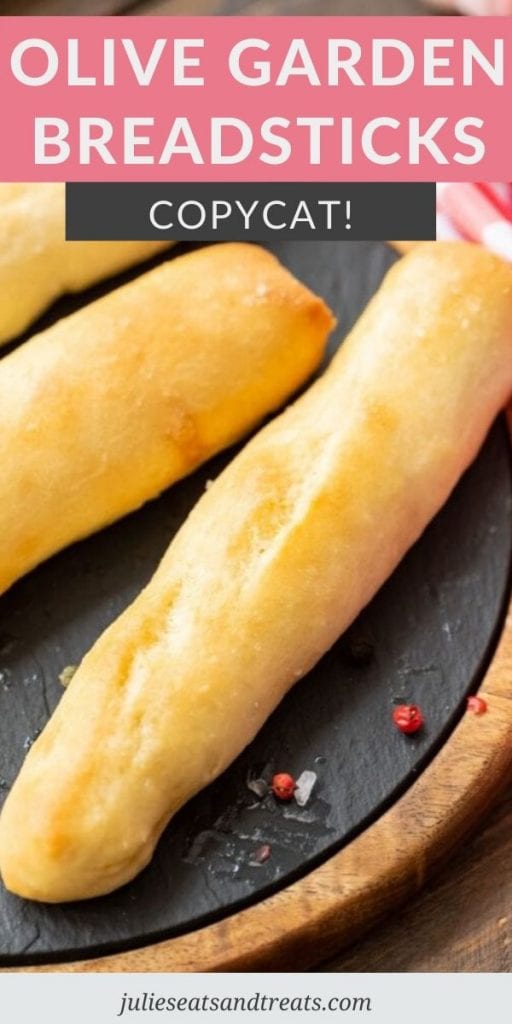 Olive Garden Breadsticks on a slate cutting board