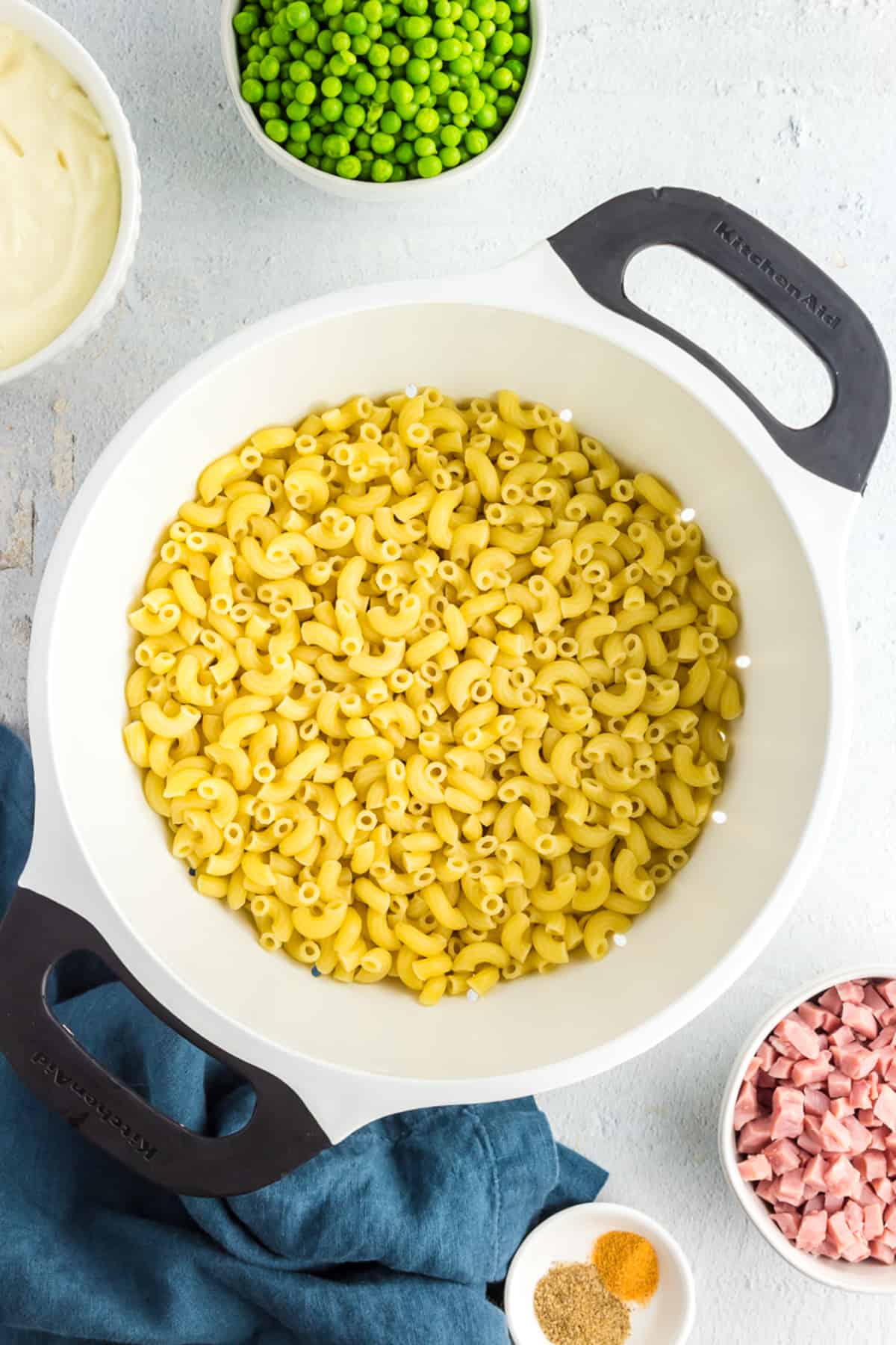 Drained elbow macaroni in colander