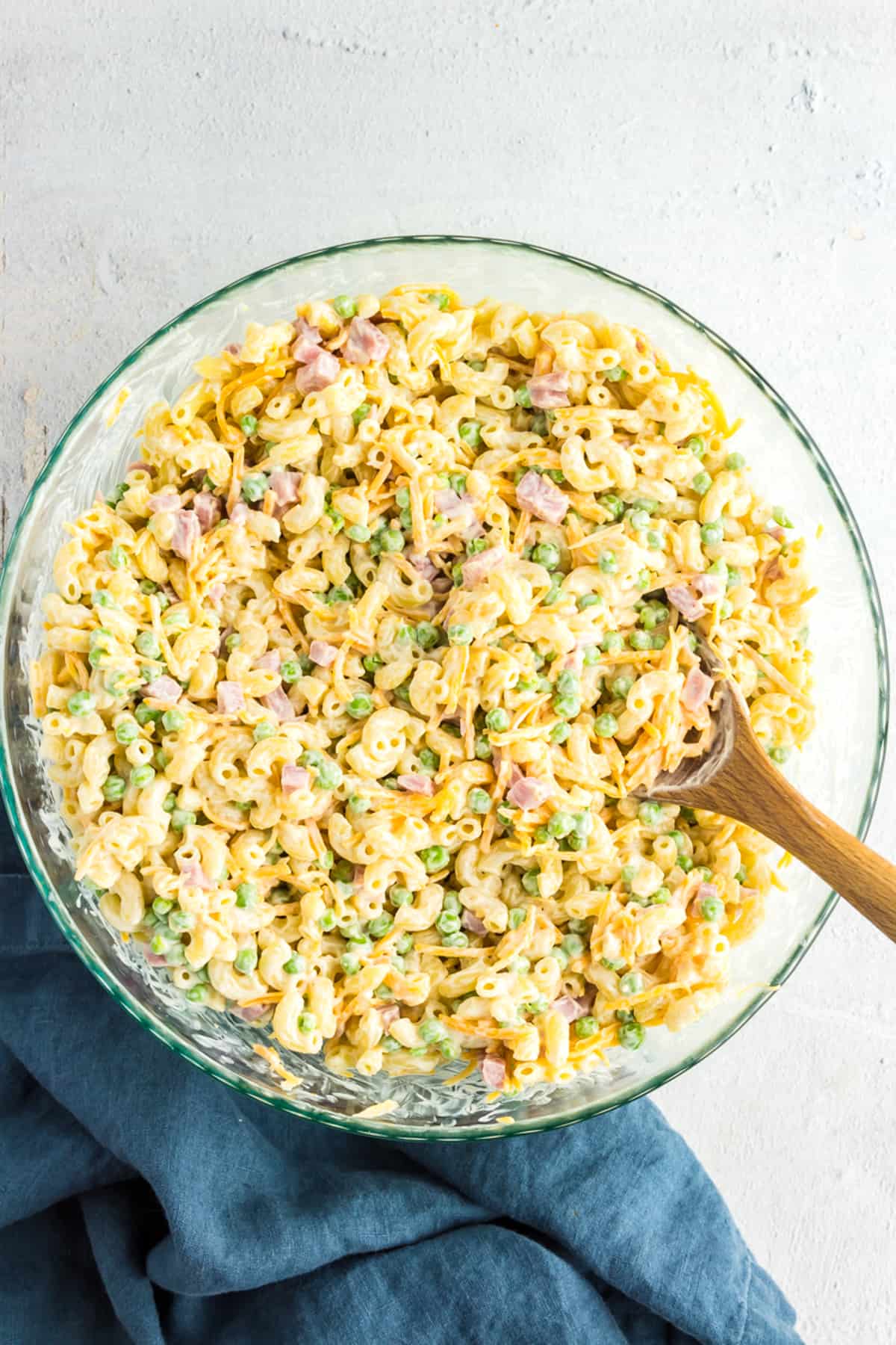 spoon in bowl of macaroni salad