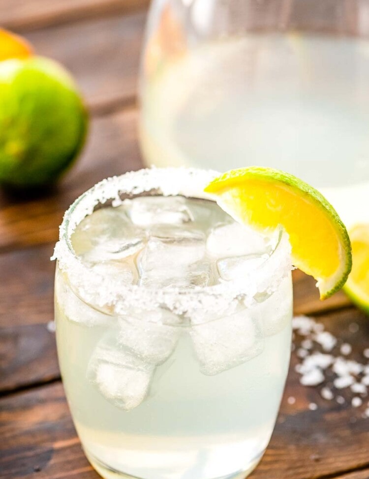 Margarita in a glass with salt and lime wedge on the rim