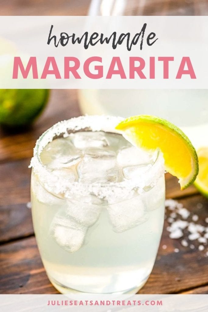 Margarita in a glass with salt and a lime slice on the rim