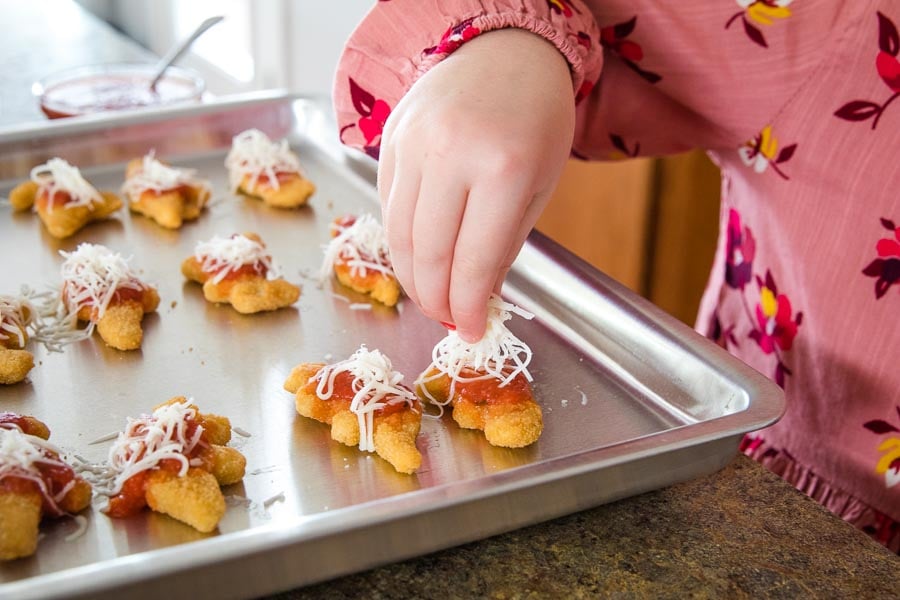 Dino Buddies Chicken Parmesan on baking sheet