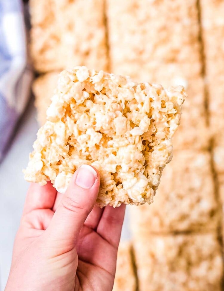 rice krispie treats bar in hand