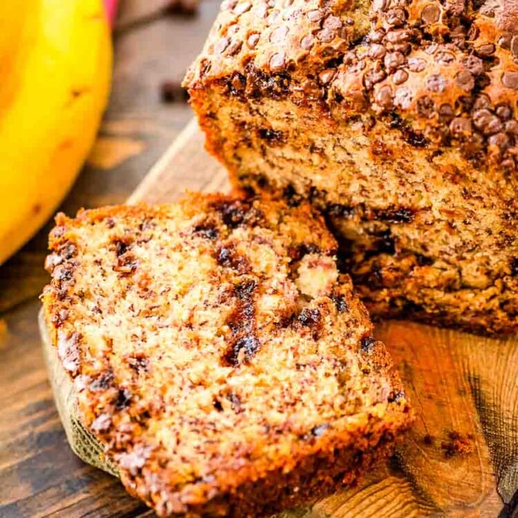 Chocolate Chip Banana Bread sliced on a wood cutting board