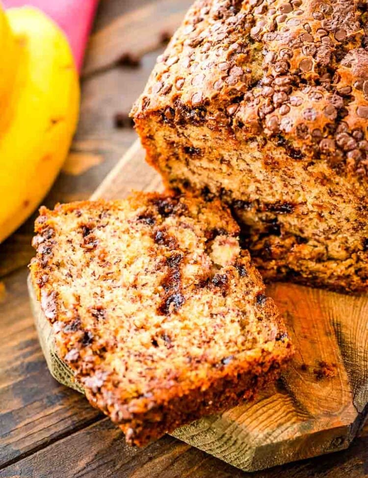 Chocolate Chip Banana Bread sliced on a wood cutting board