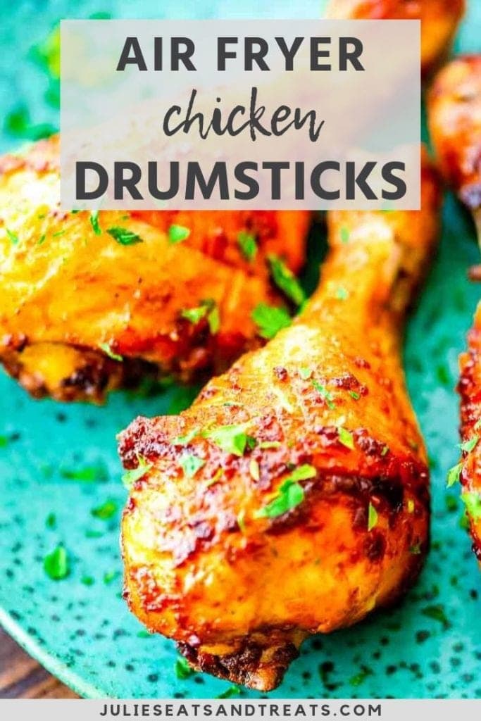 Air fryer chicken drumsticks on a blue plate