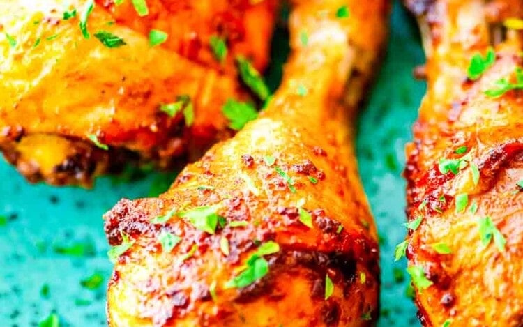 Air Fryer Chicken Legs on blue plate