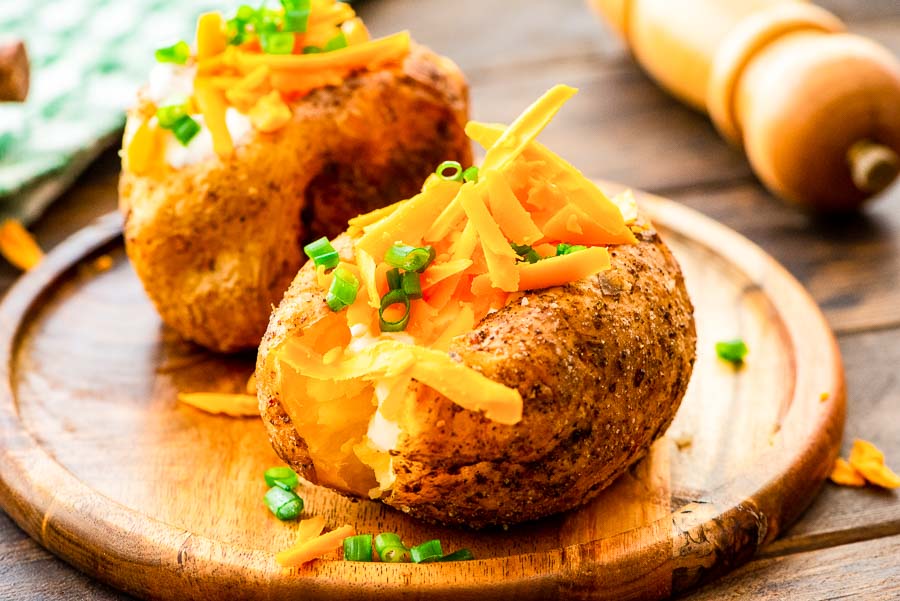 Baked Potatoes topped with cheese