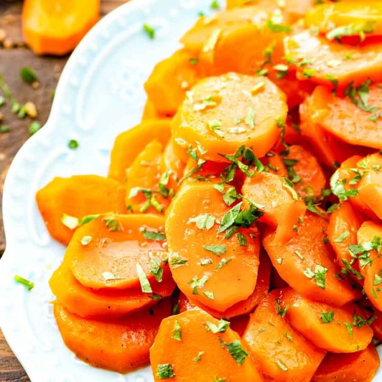 Glazed carrots on white platter