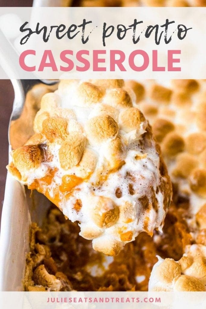 Sweet potato casserole topped with toasted marshmallows being scooped out of the baking dish