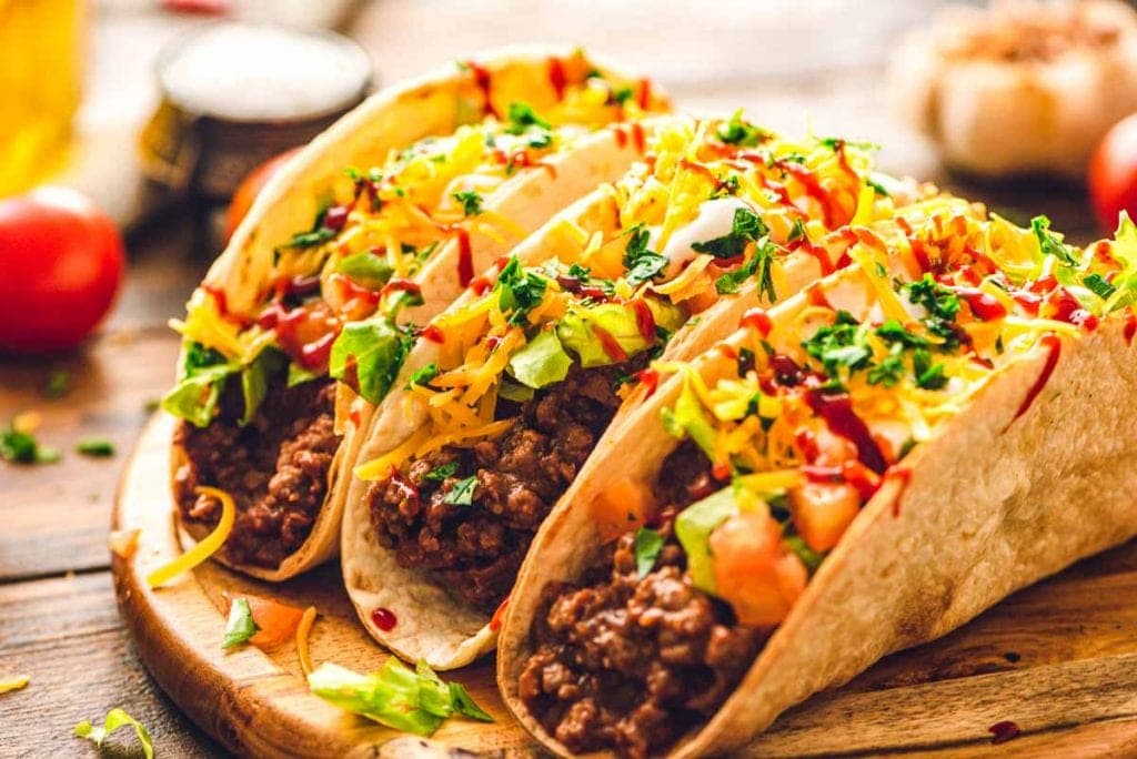 Tacos on wood cutting board