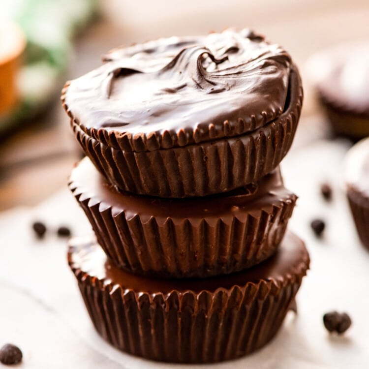 peanut butter cups stacked on wax paper