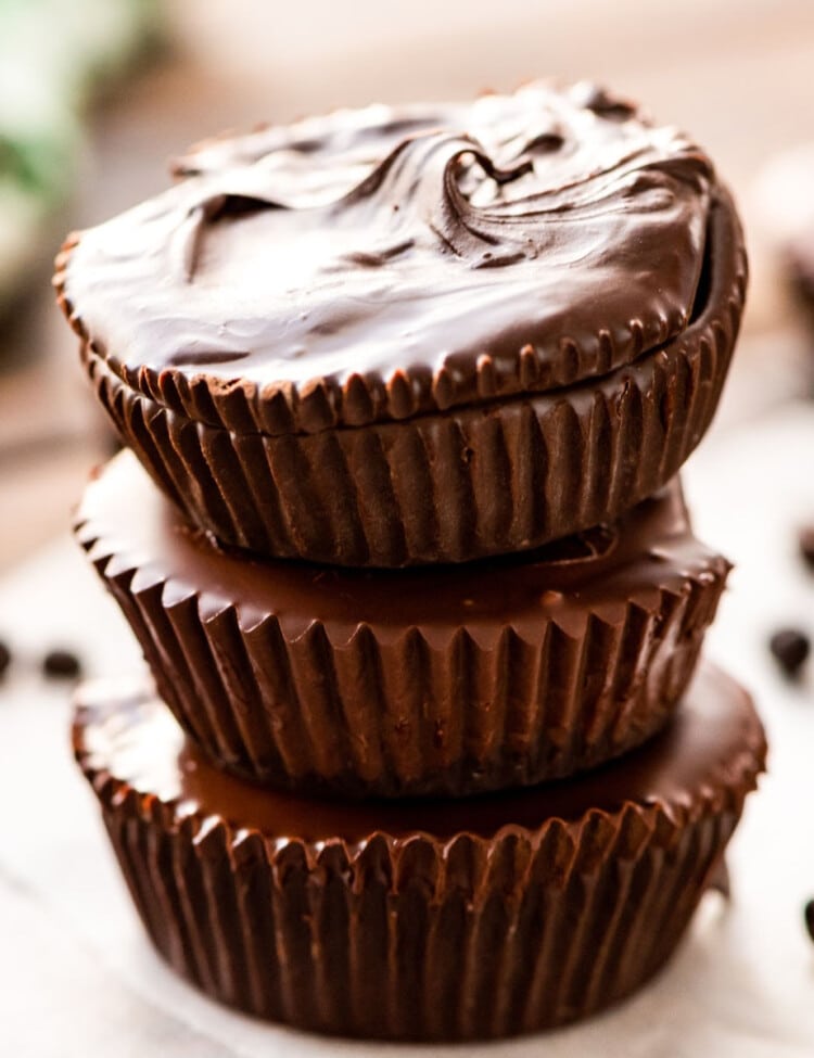 peanut butter cups stacked on wax paper