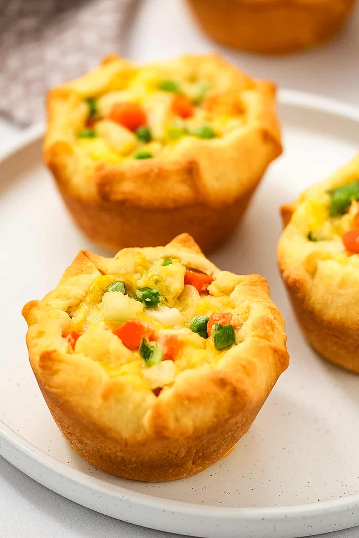 Mini Chicken Pot Pies on white plate