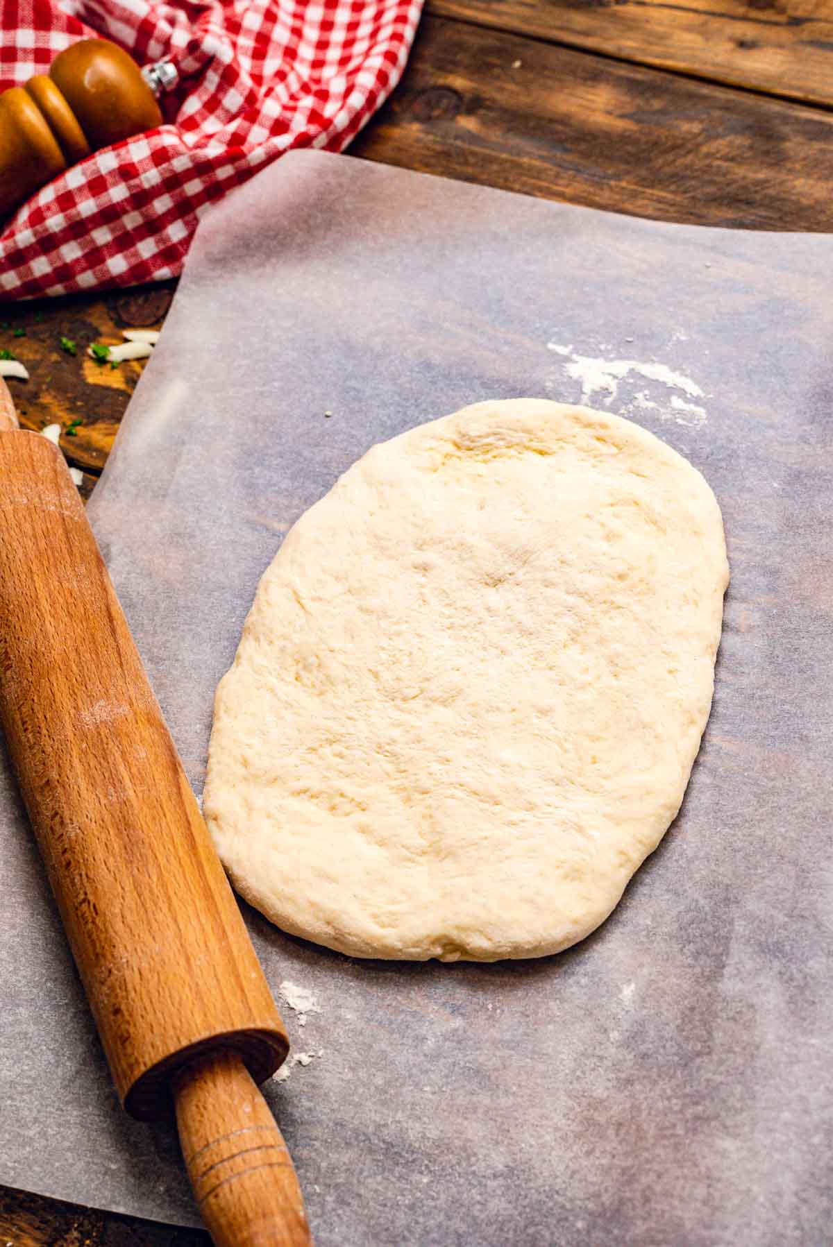 pizza dough on wax paper