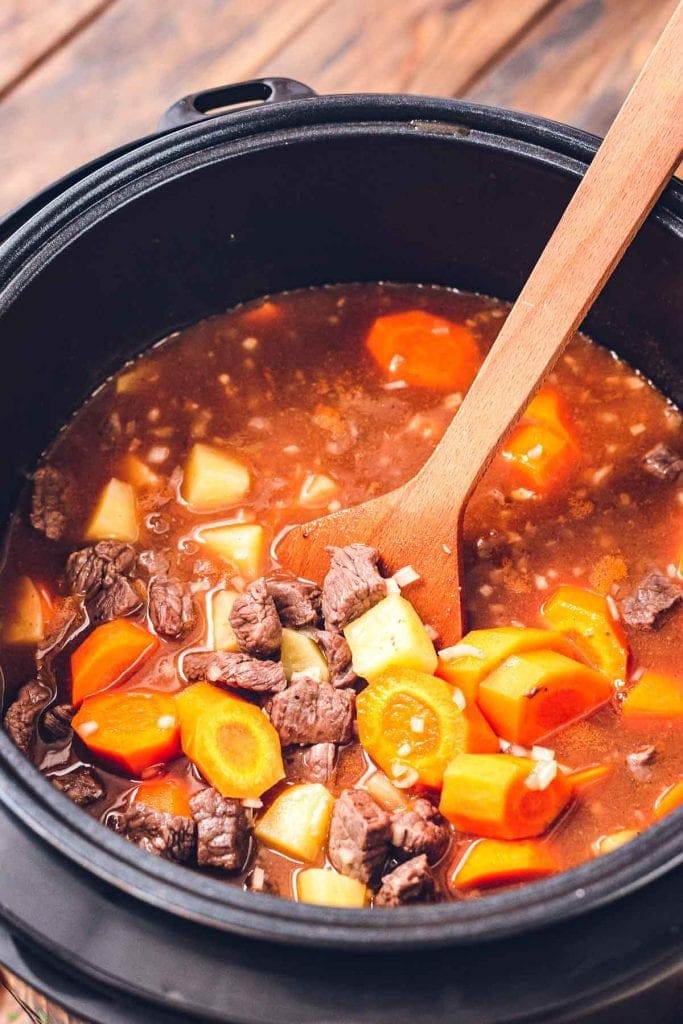 Instant Pot with ingredients for beef stew
