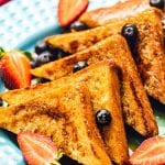 French toast with fruit on plate