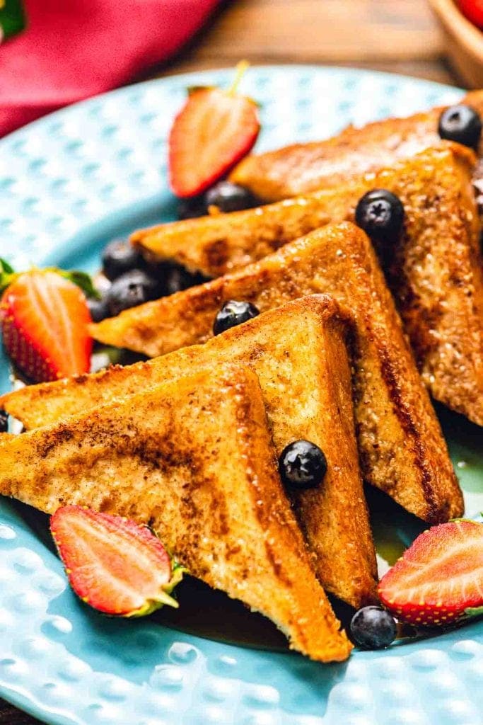 French toast with fruit on plate