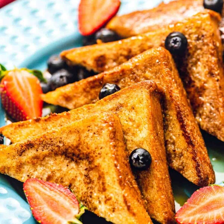 French toast with fruit on plate