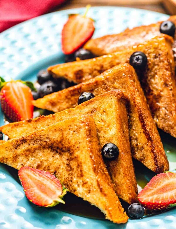 French toast with fruit on plate