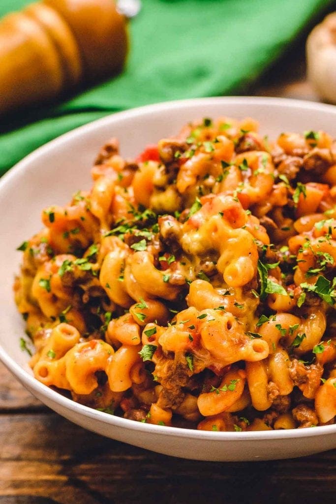 White bowl with prepared American Goulash