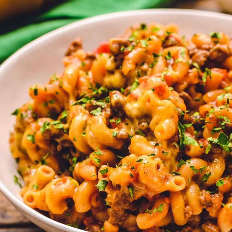 White bowl with prepared American Goulash