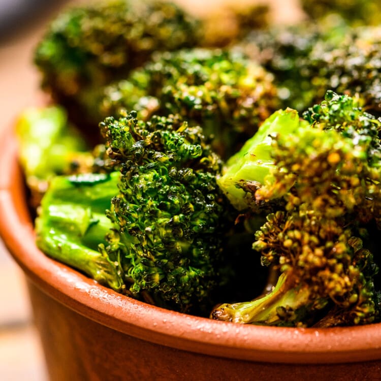 Brown bowl with roasted broccoli