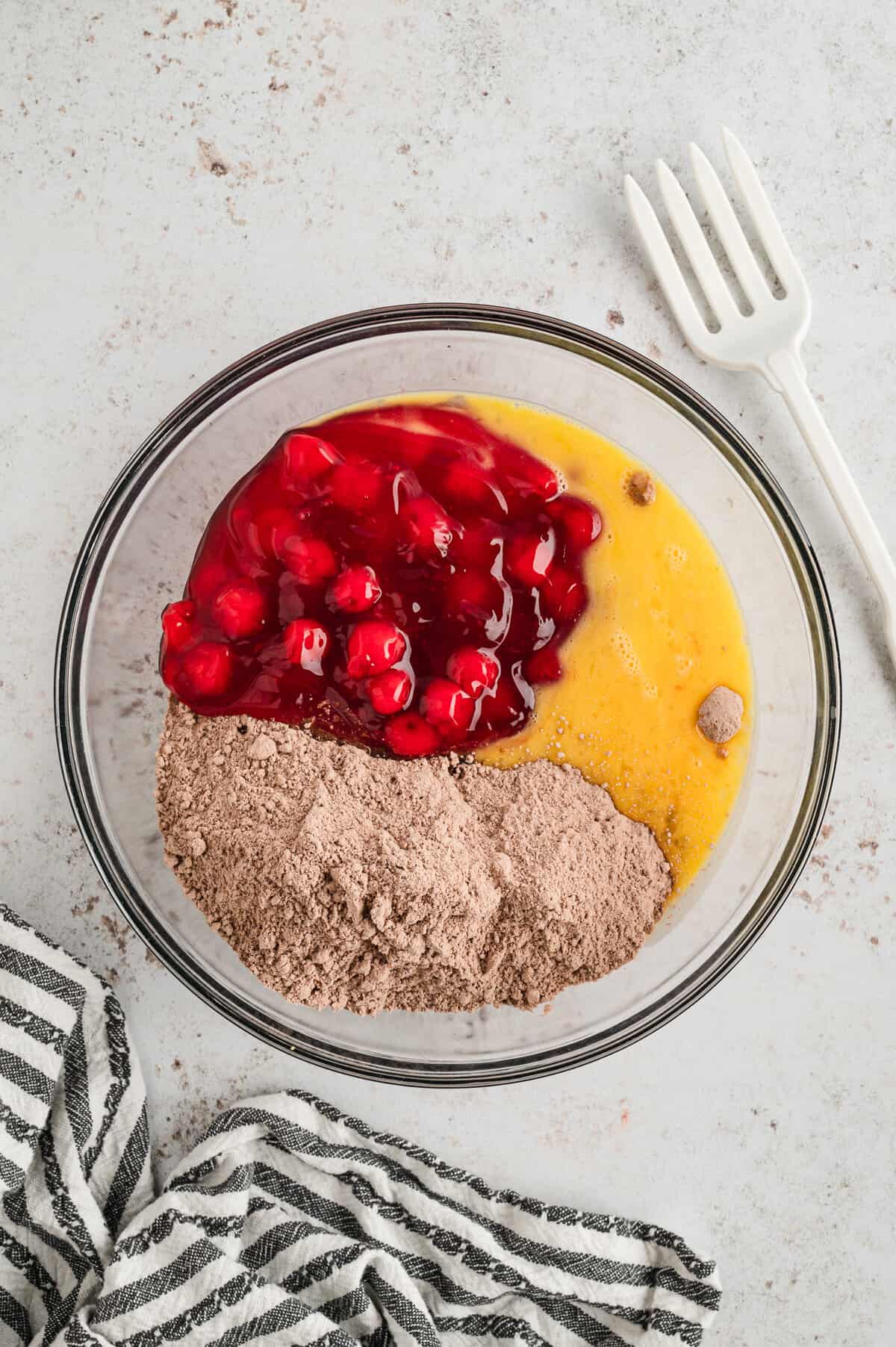 Chocolate Cherry Bars ingredients in glass mixing bowl