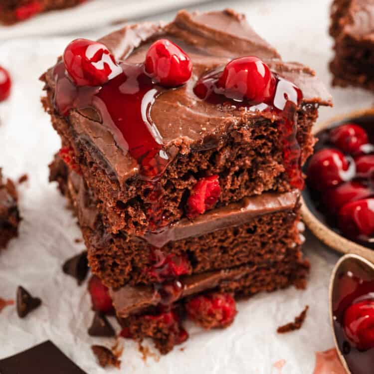 Chocolate Cherry Bars cut into squares and stacked for serving