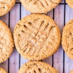 Peanut Butter Cookies on cooling rack with criss crosses on top