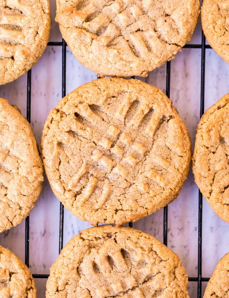 Peanut Butter Cookies on cooling rack with criss crosses on top