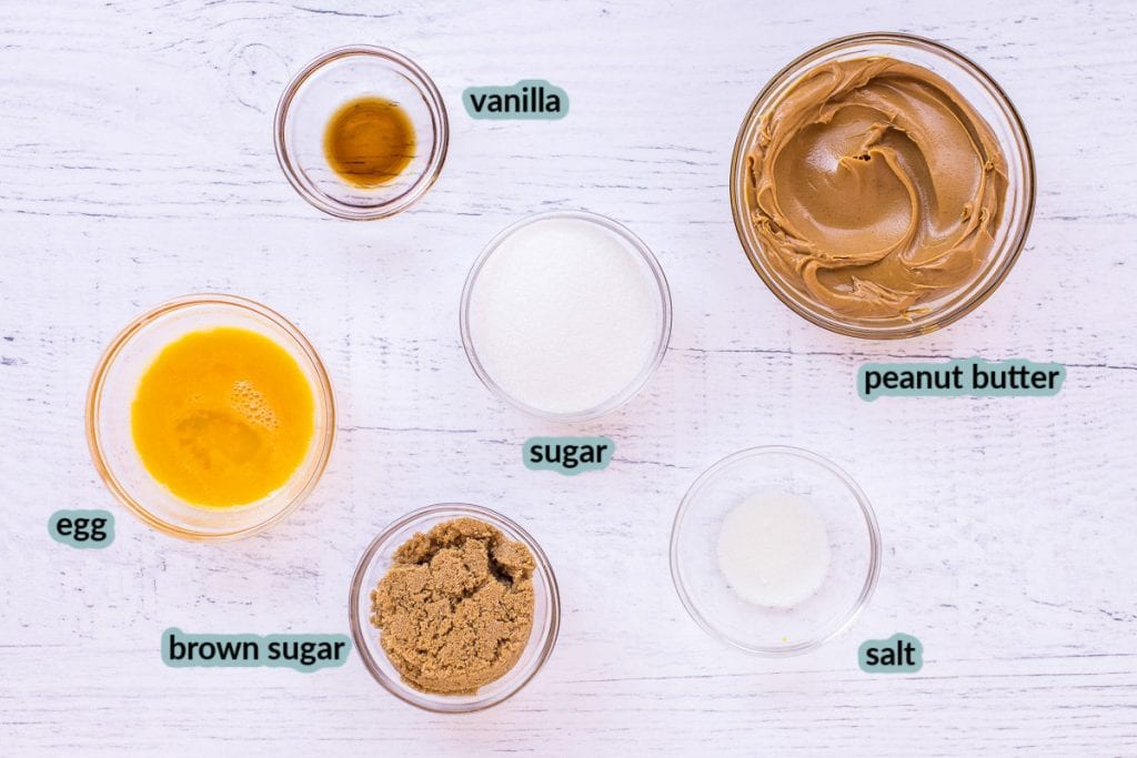 Ingredients for cookies including peanut butter egg brown sugar granulated sugar vanilla salt