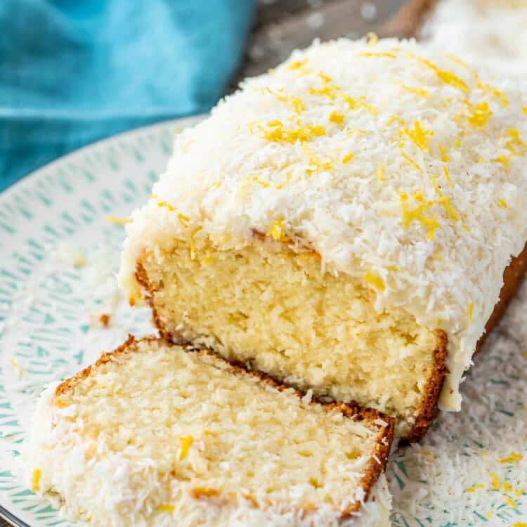 Loaf of Lemon Coconut Cake on white plate