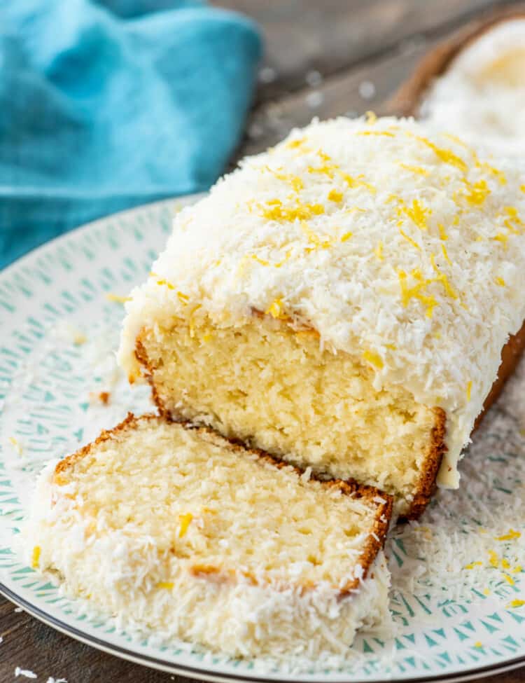 Loaf of Lemon Coconut Cake on white plate