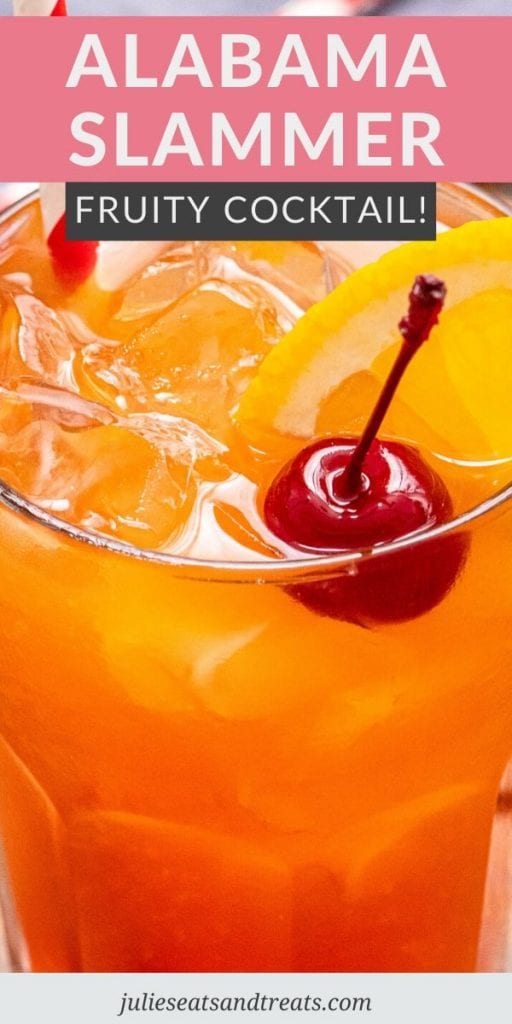 Alabama Slammer in glass with an orange slice and a cherry