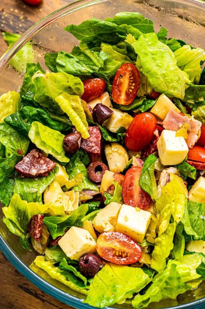 Glass bowl with a mixed antipasto salad.