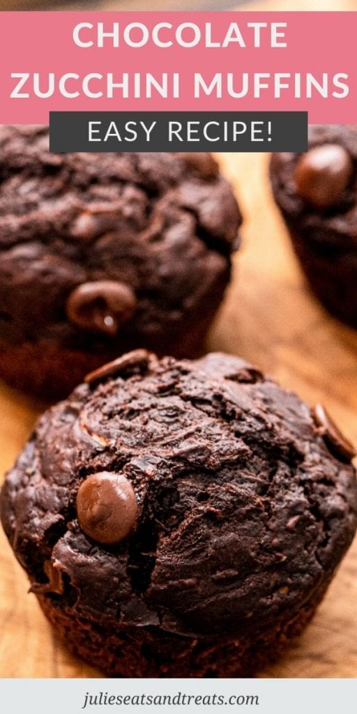 Pin Image with text overlay of Chocolate Zucchini Muffins on top and a photo of muffins below it on wood background.