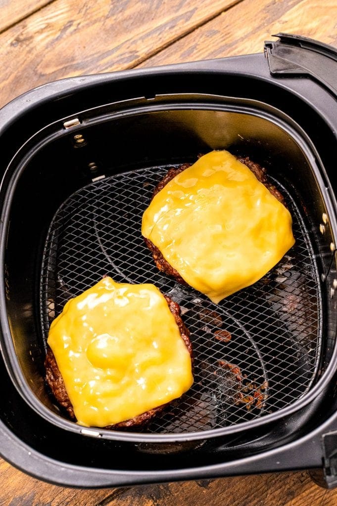 Cheeseburger in air fryer basket