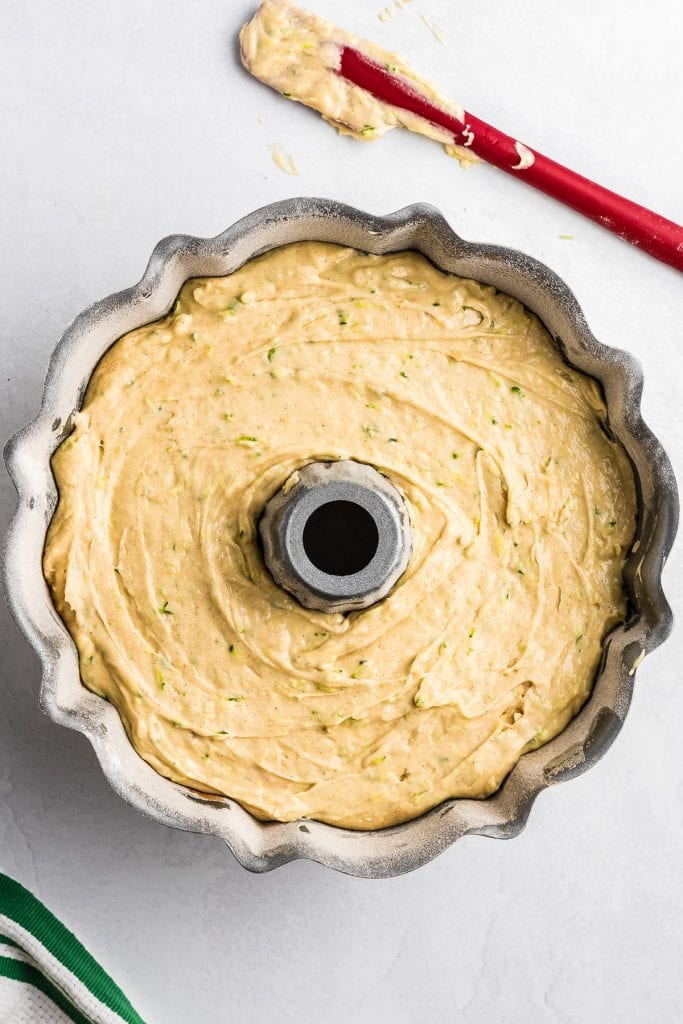 Final layer of batter in bundt cake pan.