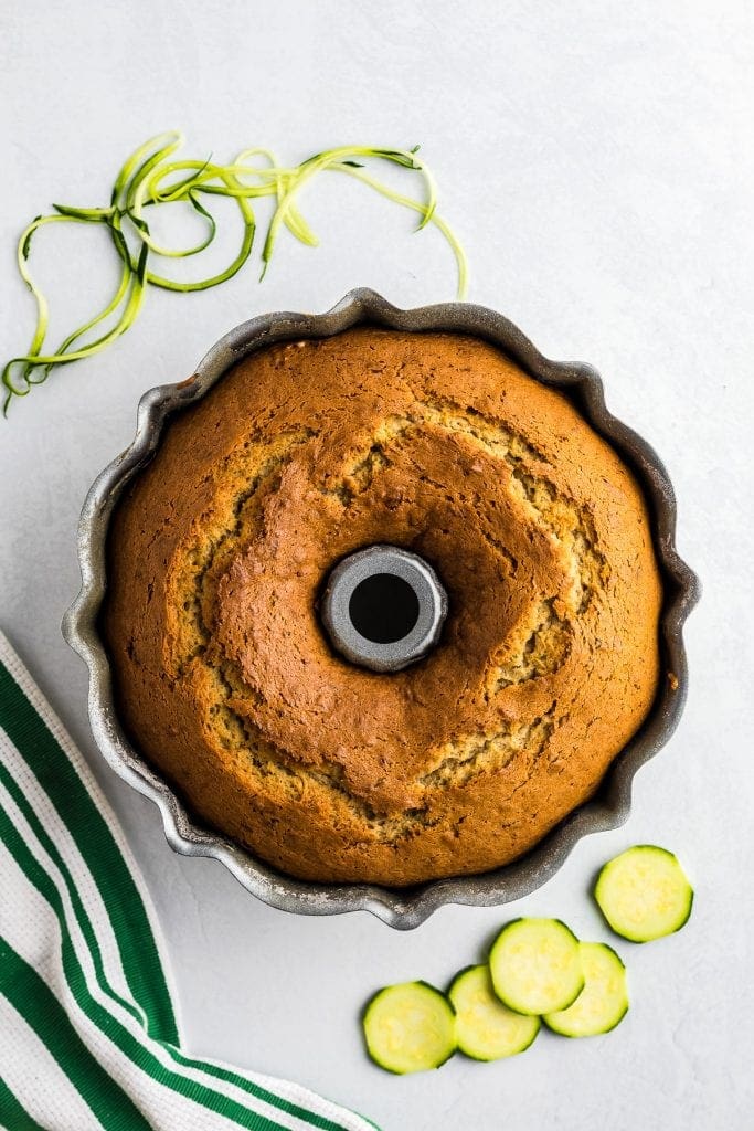 Baked Cinnamon Swirl Zucchini Bundt Cake in pan.