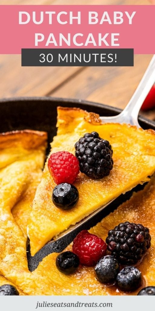 Pinterest Image with text overlay of Dutch Baby Pancake on top and the bottom has a slice of pancake with fresh berries on serving spatula.