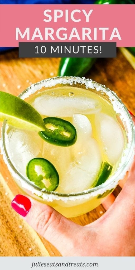 Pin Image for Spicy Margarita with text overlay of recipe name on top with pink background and an overhead image of drink in a rocks glass.