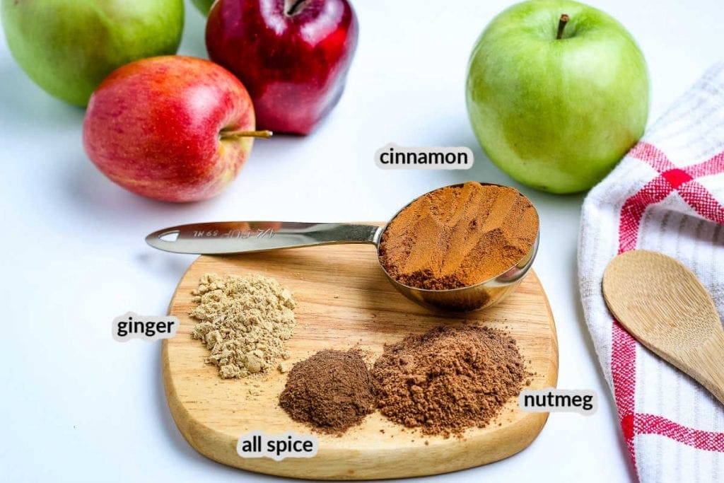 Apple Pie Spice Ingredients on a wooden board